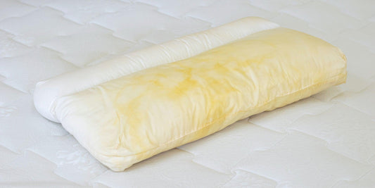 Why Does My Pillow Turn Yellow? - Somnuz Mattress